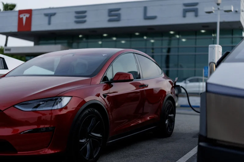 Tesla profit falls as AI, robotaxi spending accelerates