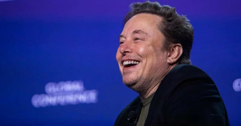 Tesla burns through a billion as Musk bets the farm on chips and bots