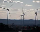 Australians value batteries and EVs, but renewables industry must earn trust of regions, summit told