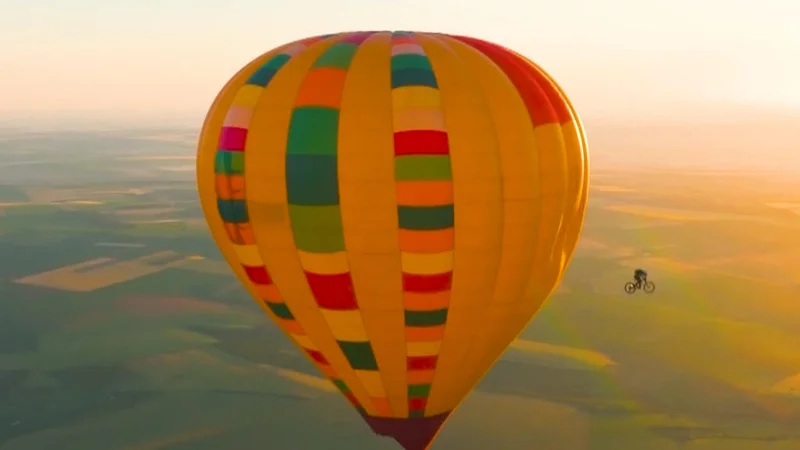 Mountain biker becomes first to ride off a hot air balloon