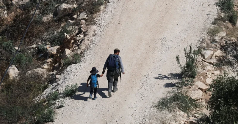 Israeli military cracks down on West Bank village as settlers march in