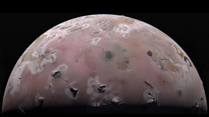 What lurks beneath the volcanoes of Jupiter's moon Io? NASA's Juno probe just took a peek