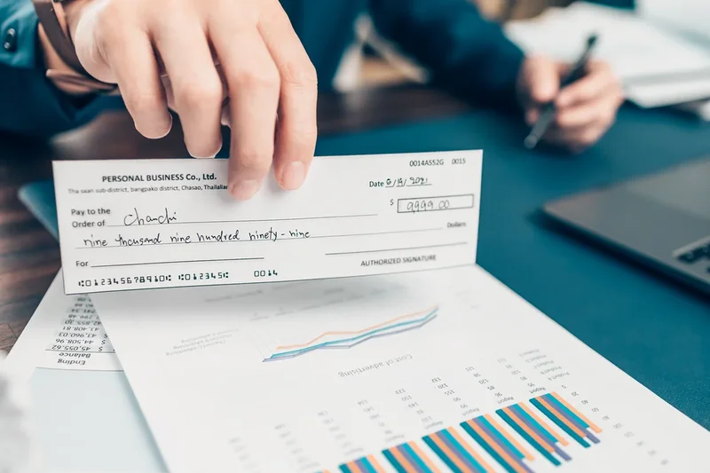 Paper checks should have disappeared by now. So why are billions still being written in the US?