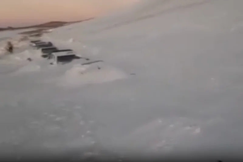 More than 200 tourists rescued from cars after massive snowstorm buries road in Argentina