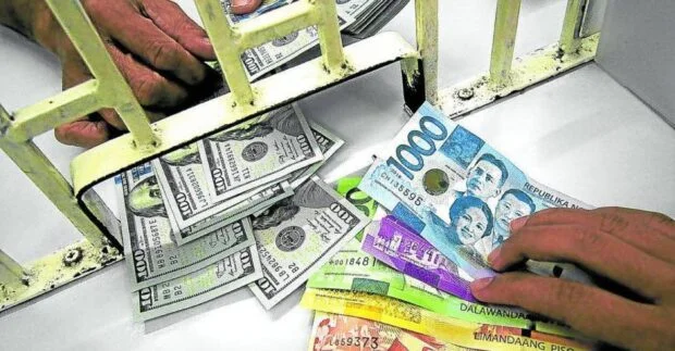 Peso sinks to new record low