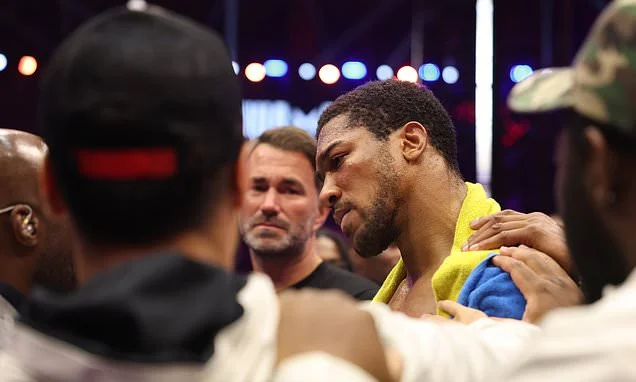 Anthony Joshua fights back tears as he dedicates dramatic victory over Kristian Prenga to two best friends killed in car crash as he recovers from TWO knockdowns to win on return
