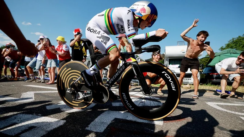 Evenepoel wins time trial for back-to-back Tour de France stage victories, Pogacar still leads