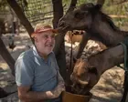 A dog saved Houssein Hamze from a bomb. When war returned, he stayed to care for Lebanon’s animals