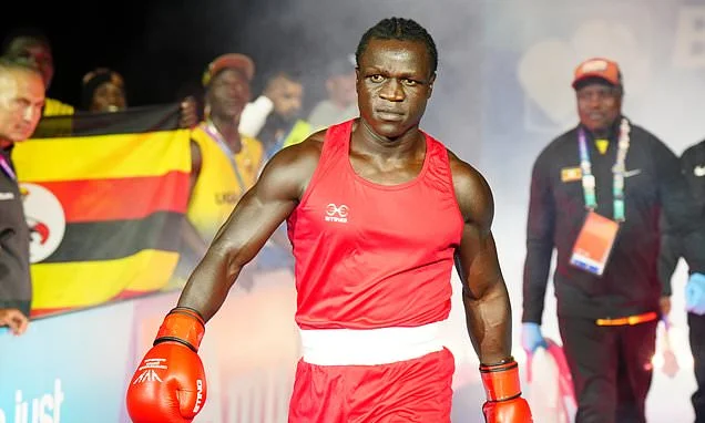 Idi Amin's grandson accuses boxing officials of bias after being disqualified for headbutting English opponent at Commonwealth Games: 'It's bulls***!'