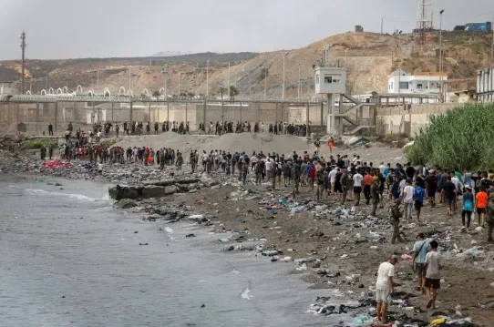 60,000 migrants from Morocco enter Spanish territory after overrunning border.