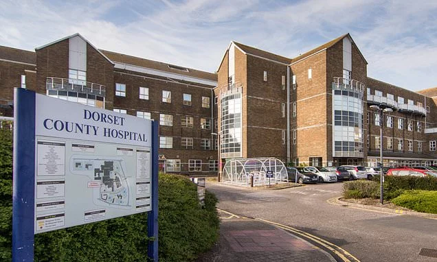NHS communications manager who accidentally showed female colleague porn on his phone wins £13,000 payout for unfair dismissal