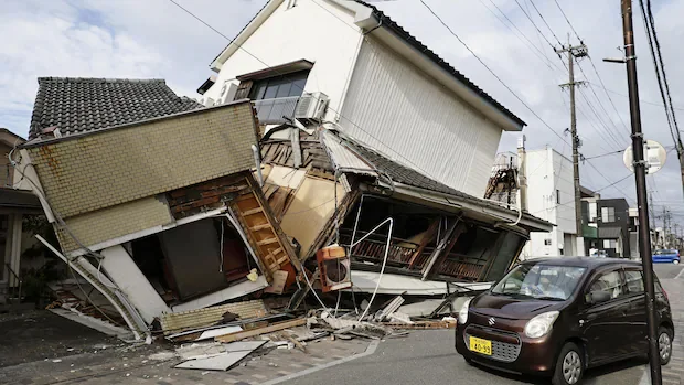 Japan PM says rescuers in 'race against time' for missing after powerful earthquake
