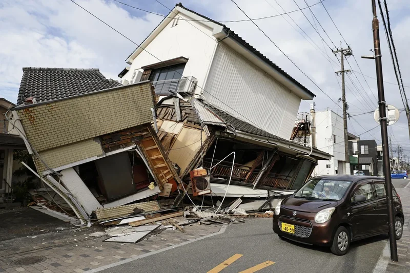 Death toll rises to 13 as rescuers search for the missing after Japan earthquake