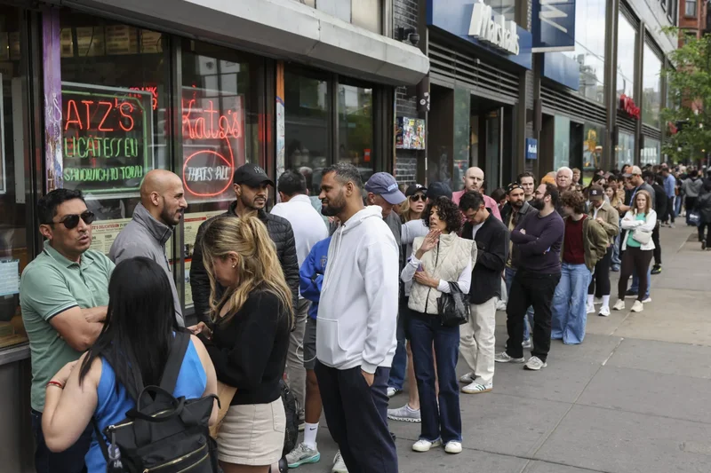 The rise of ‘conspicuous waiting’: The 19th-century economic theory that explains why Gen Z posts their place in line