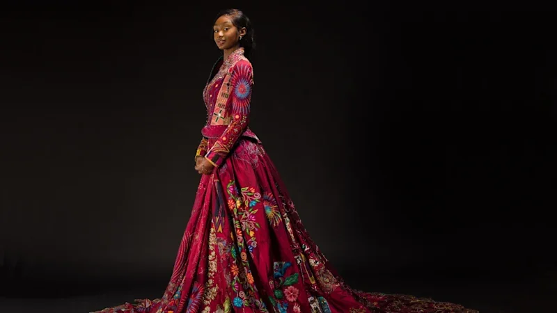 1 billion stitches, 51 countries: World record red dress on display in Brisbane