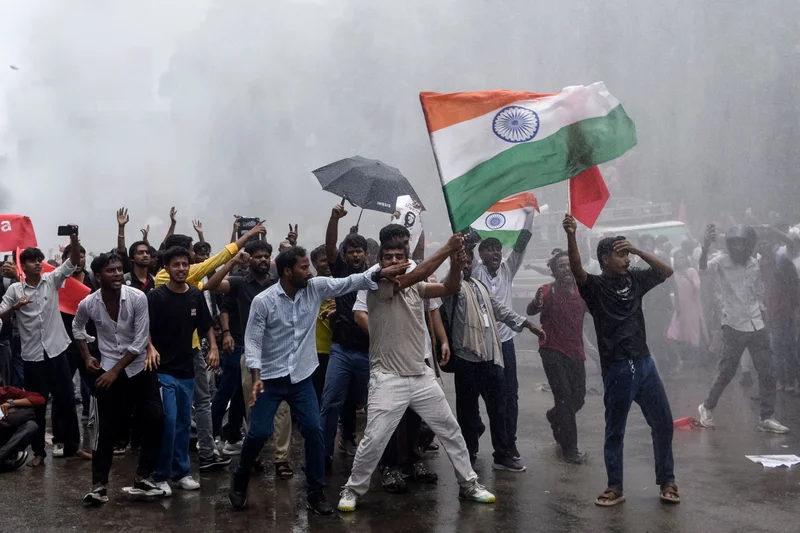 India's Modi vows exam fraud punishment amid calls to fire minister