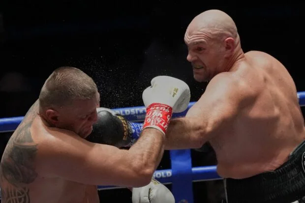Tyson Fury beats Mariusz Wach in Thailand, awaits Anthony Joshua