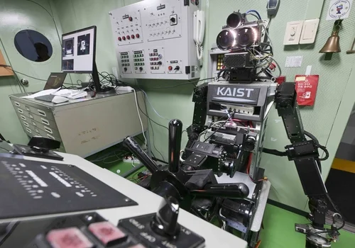 (LEAD) Navy conducts 1st combat experiment with humanoid robot as helmsman