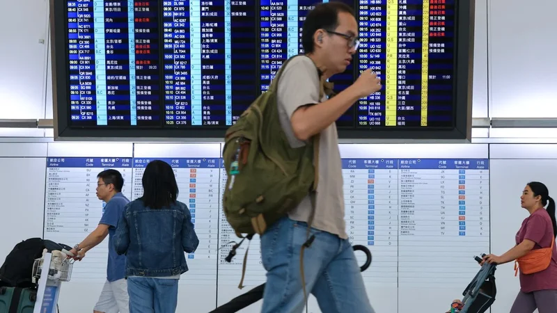 Some air passengers remain stranded at Hong Kong airport after Typhoon Noul