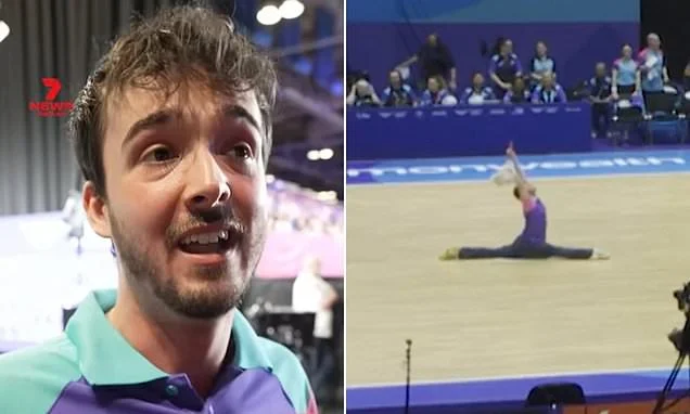 Hilarious moment cleaner steals the show at the Commonwealth Games as he dances to Queen while mopping the floor