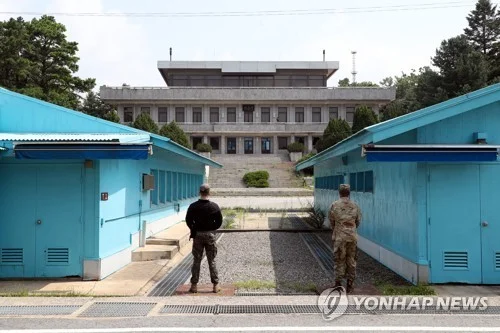 N. Korea covers inter-Korean border building in screens for apparent renovation work