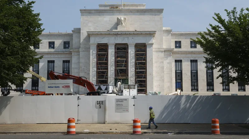Fed leaves rates steady, with internal dissent