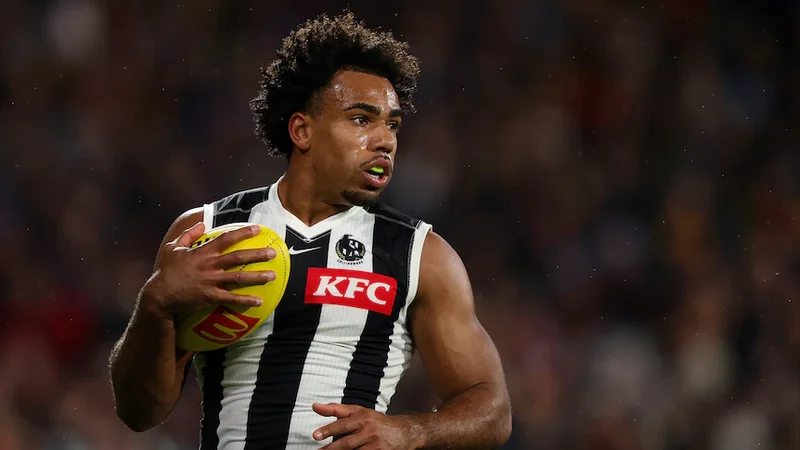 Brown slams Crows coach for his response to Quaynor booing