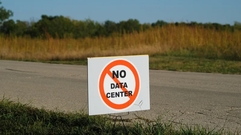 Teacher arrested for clapping in support of opposition at an AI data center meeting — gigawatt-scale project gets approved anyway despite community resistance
