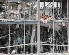 Rescue teams face ‘race against time’ in search for trapped survivors as death toll in Japan rises to at least 13 – live updates