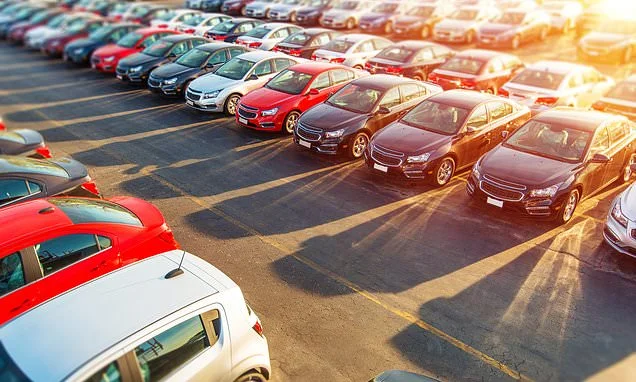 Drivers face being clobbered by tax on workplace parking spaces backed by Andy Burnham, with nearly a dozen town halls drawing up plans to bring in the levy
