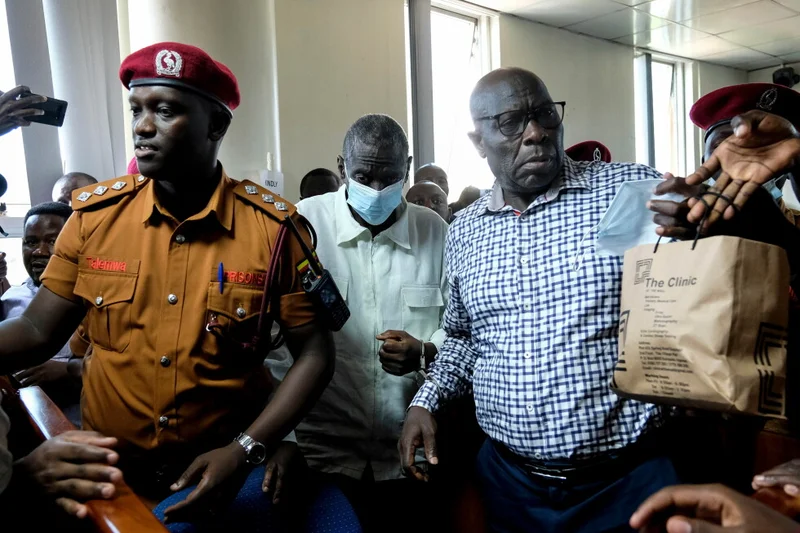 Ugandan opposition figure Besigye collapses in the dock during treason trial