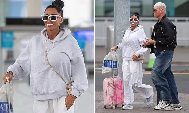 Katie Price continues to stick by conman husband Lee Andrews as she's seen with her wedding ring on after he was released from Dubai prison