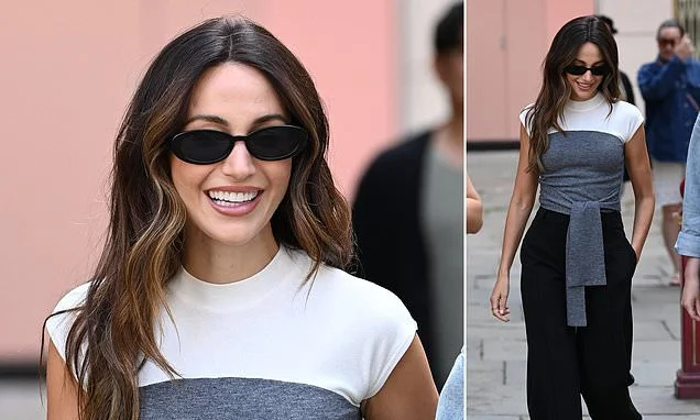 Michelle Keegan looks business chic in a two-tone top and tailored trousers as she leaves a photoshoot for her new Very range in Manchester