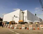 ‘Slap in the face’: LA mayor decries bid to rebuild burnt-out warehouse before cleanup is done