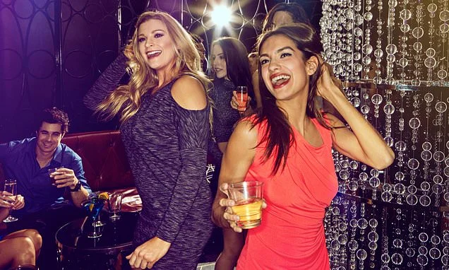 Is your night out officially 'old fashioned'? Waiting at taxi ranks, carrying cash and wearing high heels to clubs is now 'uncool', according to Gen Z