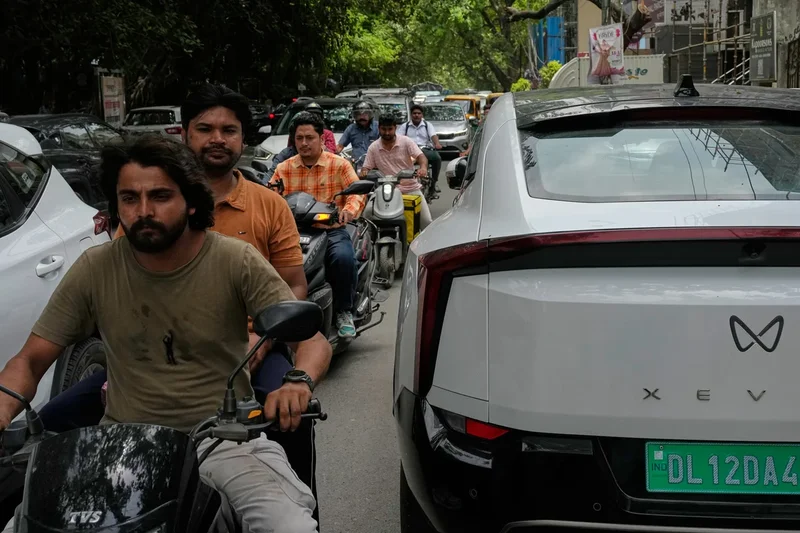 Delhi introduces new EV targets to curb air pollution. But some motorists aren’t on board
