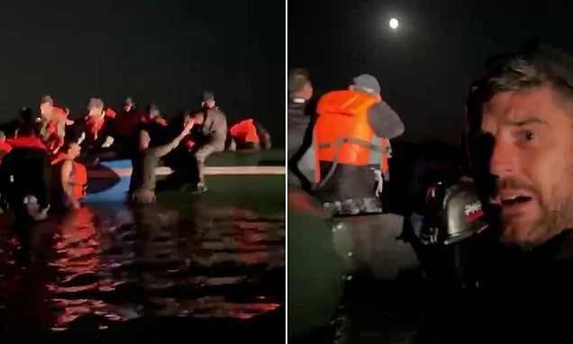 Moment packed small boat set for the UK gets caught on sandbank on a French beach... as police watch on