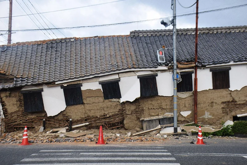 Death toll rises to 13 as rescuers search for missing after Japan earthquake