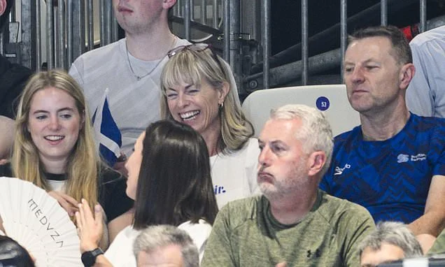 Kate, Gerry and Amelie McCann look on proudly as son Sean swims in Commonwealth Games nearly two decades after his sister Madeleine disappeared