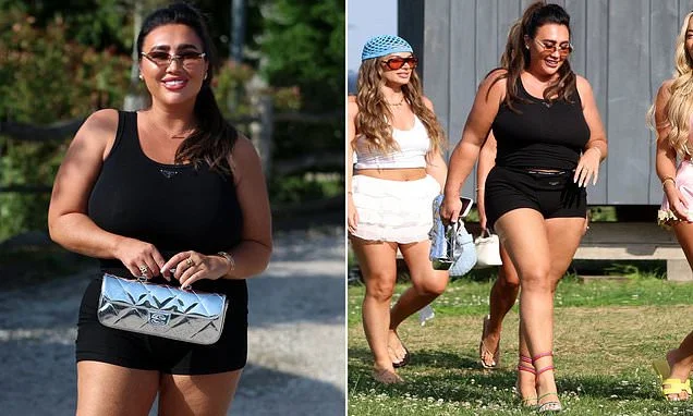 TOWIE's Lauren Goodger is clad in head to toe designer gear as she rocks £4k Chanel bag, £730 Prada vest and £75 D&G boxer shorts for filming