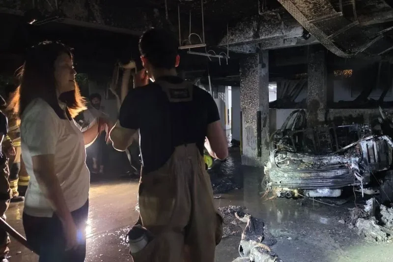 One taken to hospital after car catches fire in Yishun condo