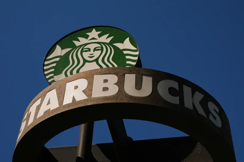 Starbucks reports strong quarterly sales and raises annual outlook