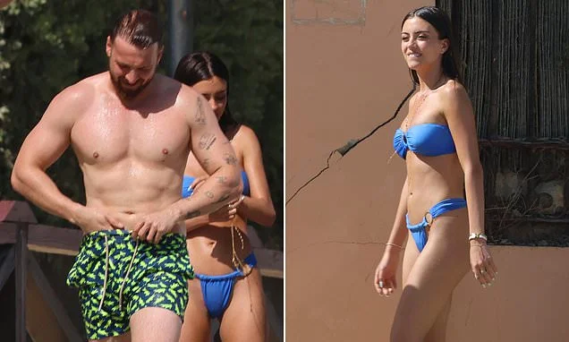 Sam Thompson shows off his buff physique as he joins bikini-clad girlfriend Talitha Balinska as they enjoy watersports on beach in Marbella