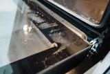 The Tiny Black Dots on Your Oven Door Have Roots in Ancient Egypt