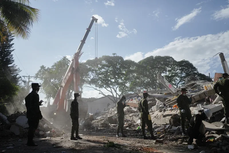 Rescuers call for silence around earthquake rubble as window for survival narrows in Colombia