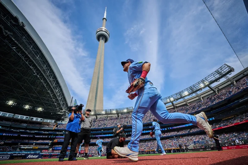 Astros add center fielder Daulton Varsho from Toronto for righty Spencer Arrighetti
