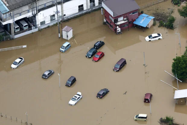 Heavy rains, flooding near Tokyo kill 4, disrupt flights, train travel