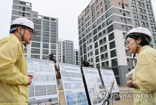 PM visits apartment construction site to encourage speedy supply