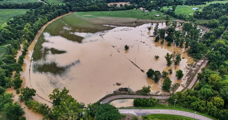 Floodwaters submerge Midwest neighborhoods bracing for more severe storms