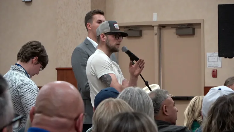 Alberta minister met with jeers at AI data centre town hall